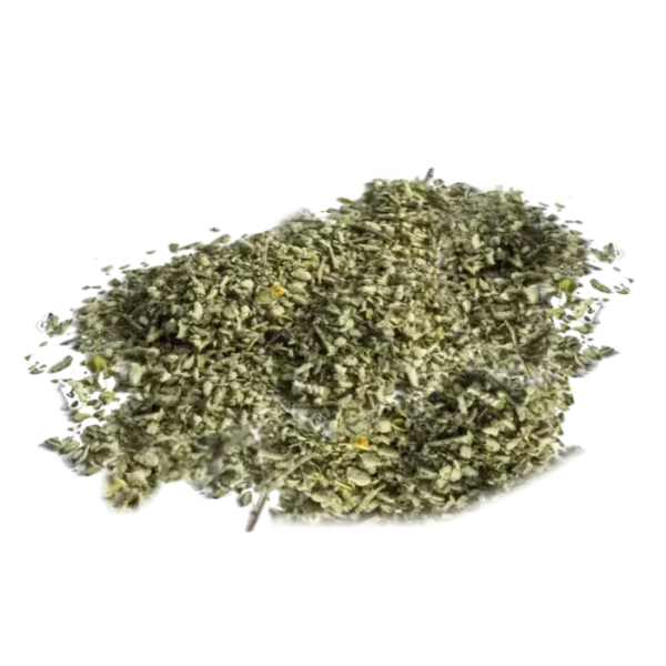 Pile of dried green herbs with yellow specks